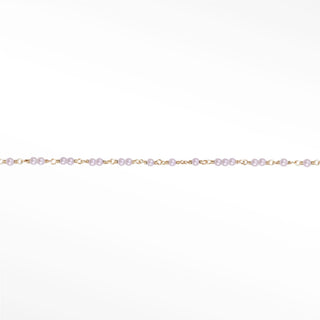 Nina Wynn Ethereal Pearl Permanent Bracelet with beads linked by solid 14k yellow gold wire.