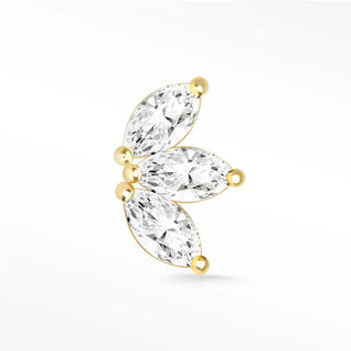 A delicate gold-toned 14k moissanite earrings baby lotus ear cuff from the wynning studs collection with three clear gemstones