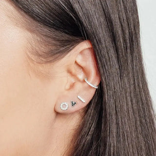 Silver geometric flat back diamond donut earrings in 14k white gold with pave diamonds and black accent stones
