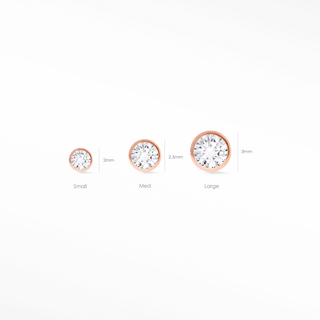 Shop our 2mm bezel diamond flat back earring in 14k rose gold. Perfect for daily wear cartilage or lobe piercings.