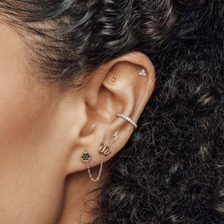 An easy, comfortable style designed for daily wear and relaxed sleeping. Ideal for styling multiple piercings. 