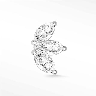 A sleek silver-toned hypoallergenic flat back ear cuff with three marquise-cut gemstones by the wynning studs