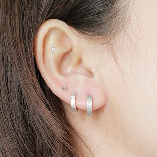 Discover the elegance of flat back earrings featuring marquise moissanite in 14k white gold. Perfect for any occasion!