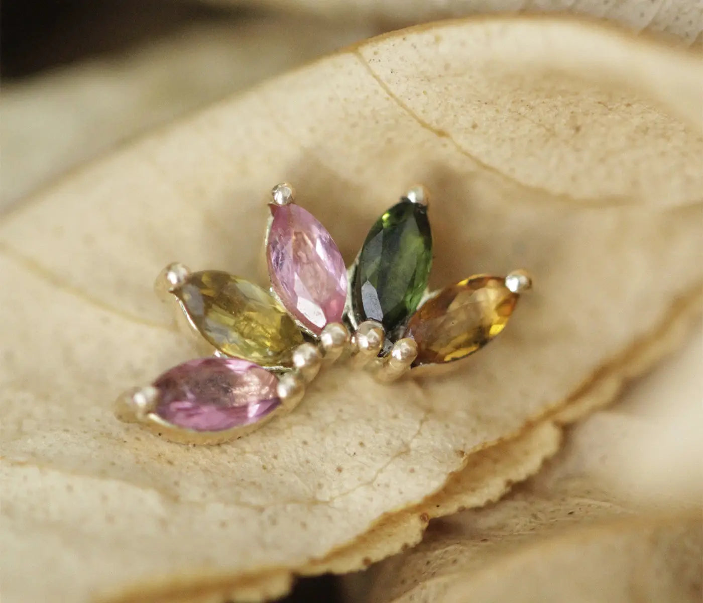 Flat-back earrings styled for lobe and cartilage piercings