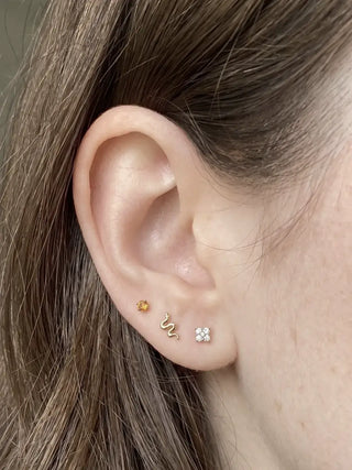 Discover the wynning studs featuring flatback gemstones perfect birthstones in stunning 14k yellow gold. Elegant
