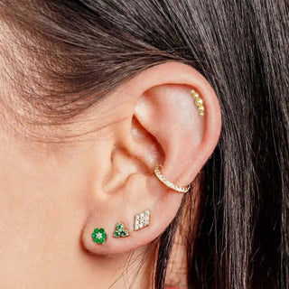 Gold-toned 14k yellow croissant ear cuff with small round beads along its curved edge in flat back earrings stud design