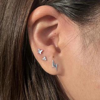 Flat back earrings trinity diamond 14k white gold with silver butterfly and lightning bolt studs from the Wynning Studs collection