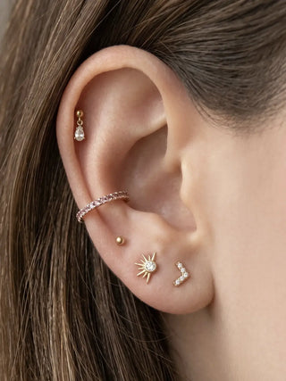 Flat back gold earrings designed with a smooth low-profile for secure comfort. Ideal daily wear sensitive ears