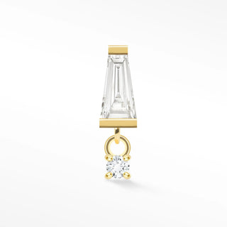 A sleek gold flat earring moissanite with a long faceted gemstone and diamond from the wynning studs collection