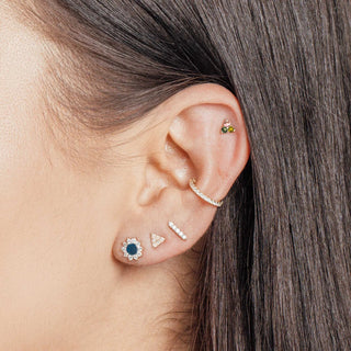 A delicate silver flatback ear cuff adorned with a row of sparkling diamonds from the wynning studs collection