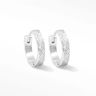 Florentine sterling silver hoop earrings with a textured woven pattern in silver rhodium hoop 15mm design