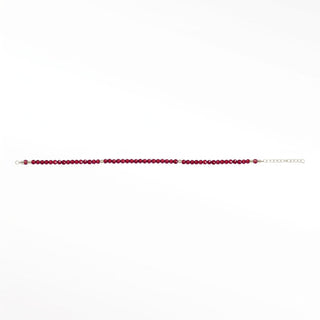 Garnet Red gemstone beads close-up; metal fittings are outside the crop