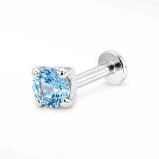 Blue Topaz flat back stud in 14K White Gold with a titanium labret