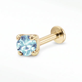 Aquamarine flat back stud in 14K Yellow Gold with a titanium labret