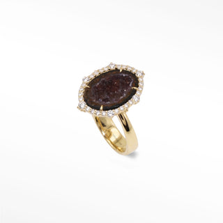 Earthy and unique our one-of-a-kind geode ring adorned with vivid diamonds is a true delight.