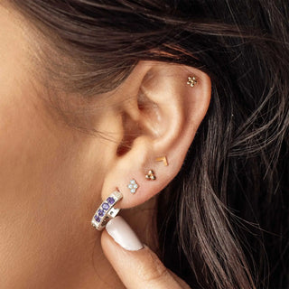 Gold flat back earrings 14k chevron wynning studs with silver hoops adorned with purple gemstones