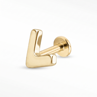 14k gold flat top earring paired with a 5 mm hypoallergenic titanium labret, offering a sleek, comfortable fit for most healed piercings. A 14k gold labret is also available separately.