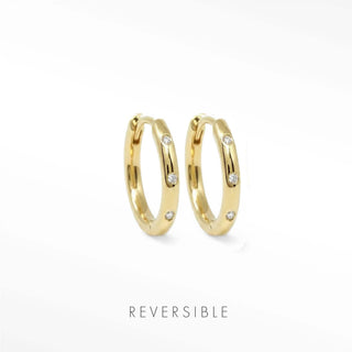 Ellie 13mm 14K yellow gold hoops with spaced round lab-grown diamonds along polished fronts.