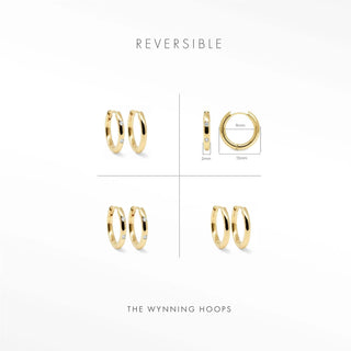 Simple gold hoop earrings shown from side angle