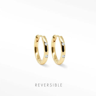 Ellie diamond gold hoop earrings 14k featuring three small clear gemstones along each side of reversible hoops