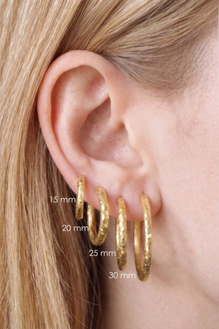 Gold-toned hammered hoop earrings in sizes 15, 20, 25, and 30 cm stylish gold hoop earrings for versatile wear