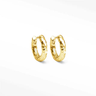 Gold-tone hammered hoop earrings with a textured faceted surface in gold hoop design