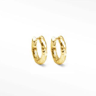 Gold hoop earrings with hammered textured faceted surface in a classic hoop earrings design