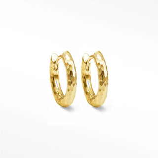Gold-tone hammered hoop earrings with textured faceted surface featuring elegant gold hoop design