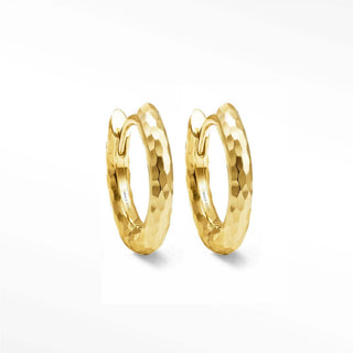 Gold-tone hammered hoop earrings with a textured faceted surface and elegant gold hoop design