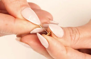 instruction on how to pull flat back earring to remove from the top