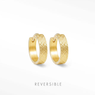 Gold-colored textured florentine huggie earrings with a reversible design by wynning reversible hoops