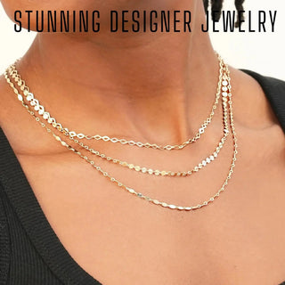 Gold-toned layered necklace with intricate geometric chain links for a bespoke jewelry experience gift