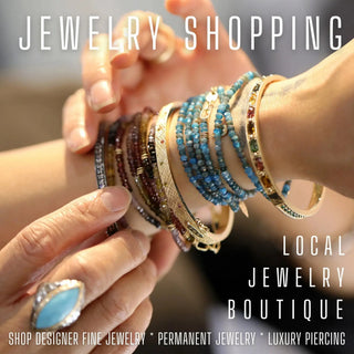 A woman’s wrist with stacked blue and gold beaded bracelets in a jewelry shopping appointment featuring nina wynn