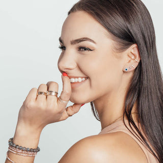 Luxury ear piercing and fine jewelry styling in Denver