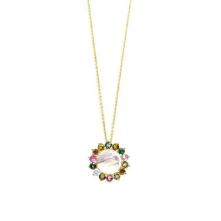 A delicate maya moonstone gold 14k necklace with a central moonstone pendant and multicolored gemstone halo