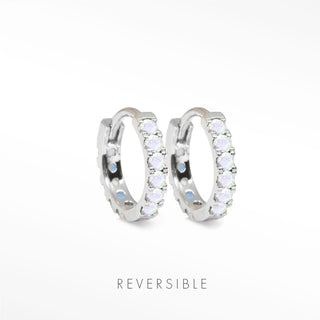 Nina Wynn Natalie 14mm sterling silver reversible hoops with Genuine Moonstone gemstones facing forward.