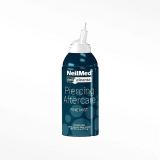 Neilmed piercing aftercare neilcleanse fine mist in a dark teal plastic bottle with white spray nozzle for piercing aftercare