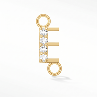 Nina Wynn sideways initial E connector with lab-grown diamonds in solid 14k yellow gold.