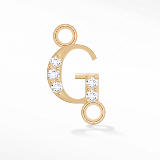 Nina Wynn sideways initial G connector with lab-grown diamonds in solid 14k yellow gold.