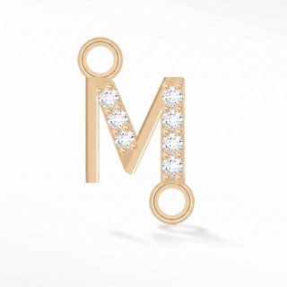 Nina Wynn sideways initial M connector with lab-grown diamonds in solid 14k yellow gold.