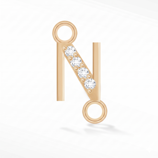 Nina Wynn sideways initial N connector with lab-grown diamonds in solid 14k yellow gold.