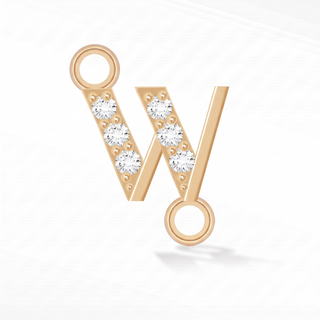 Nina Wynn sideways initial W connector with lab-grown diamonds in solid 14k yellow gold.