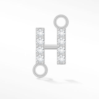 Nina Wynn sideways initial H connector with moissanite in 925 sterling silver.