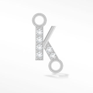 Nina Wynn sideways initial K connector with moissanite in 925 sterling silver.