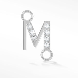 Nina Wynn sideways initial M connector with moissanite in 925 sterling silver.
