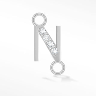 Nina Wynn sideways initial N connector with moissanite in 925 sterling silver.