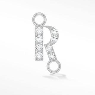 Nina Wynn sideways initial R connector with moissanite in 925 sterling silver.