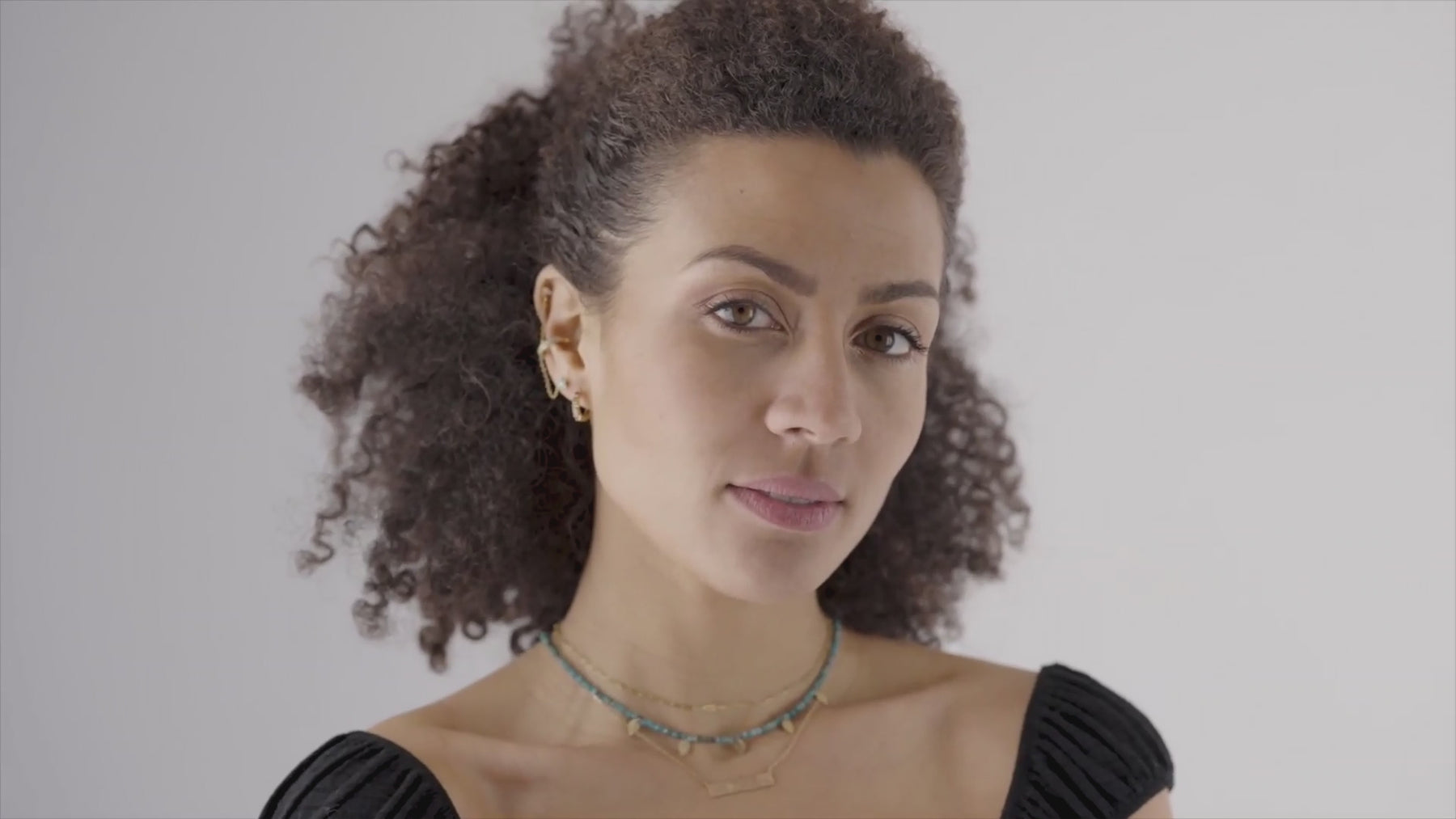 Nina Wynn fine jewelry, permanent jewelry and ear piercing studio in Denver showcasing modern jewelry design and client experience