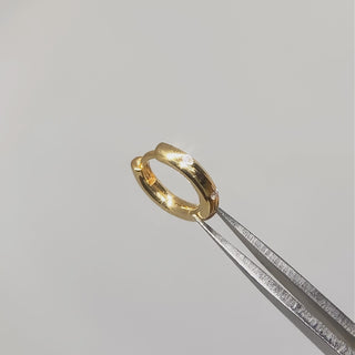 Vermeil hoop earrings with diamonds shown on moving