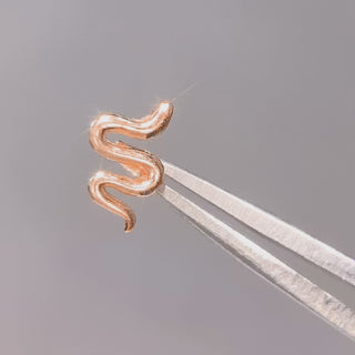 Snake flat back earrings, in 14k rose gold, a sleek snake silhouette design and finish.